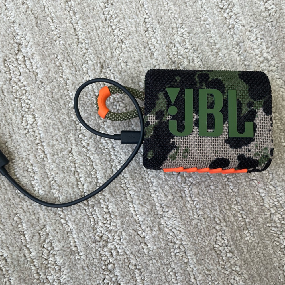 JBL Camouflage Speaker with Green and Orange Accents
